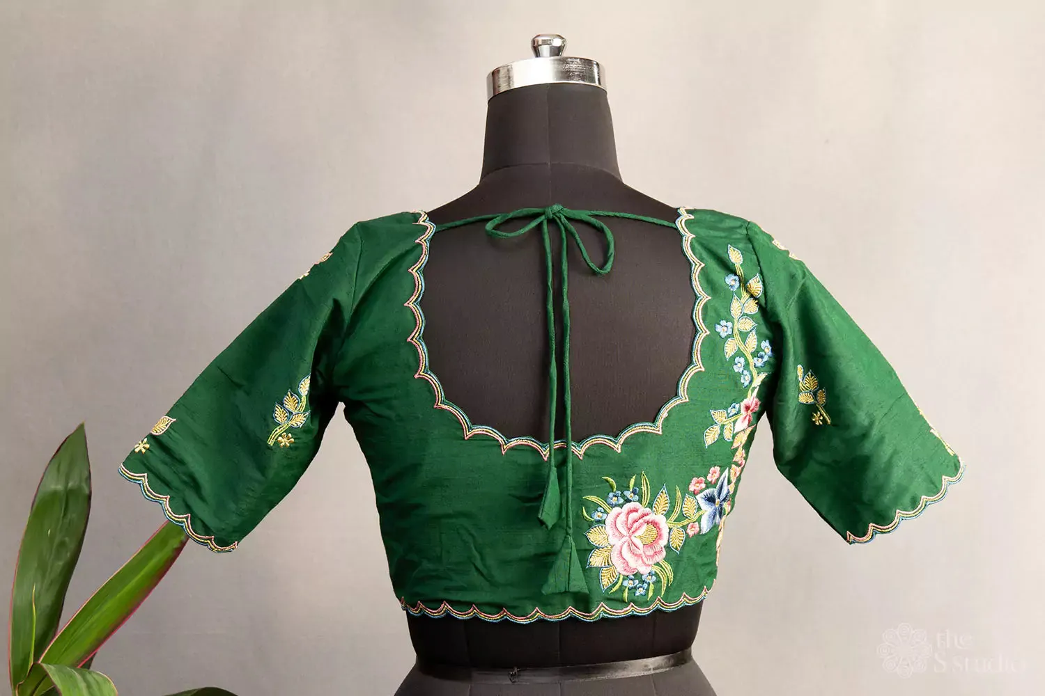 Green hand embroidered cotton blouse with scallop neck pattern